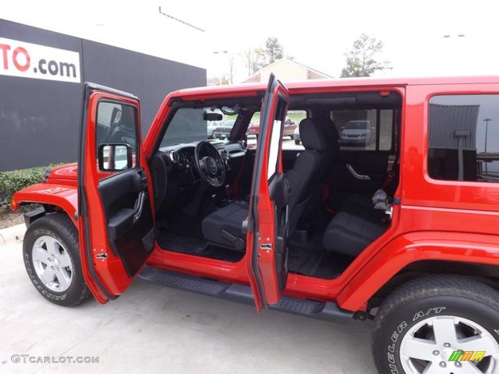 2012 Wrangler Unlimited Sahara 4x4 - Flame Red / Black photo #9