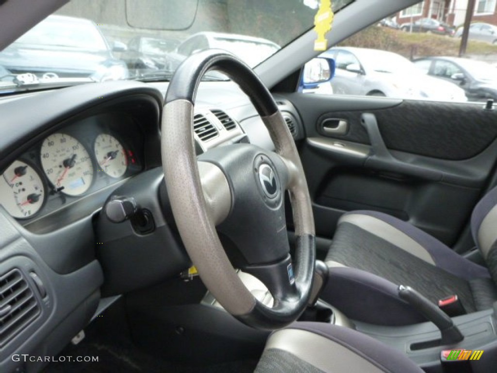 2001 Mazda Protege MP3 Off Black Steering Wheel Photo #78783544