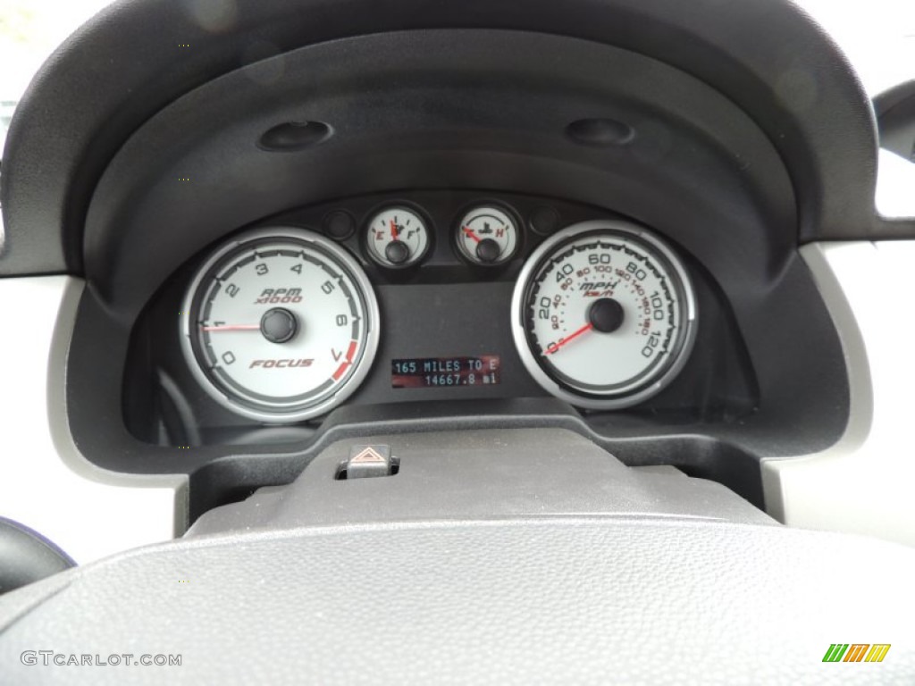 2011 Ford Focus SES Sedan Gauges Photo #78799392