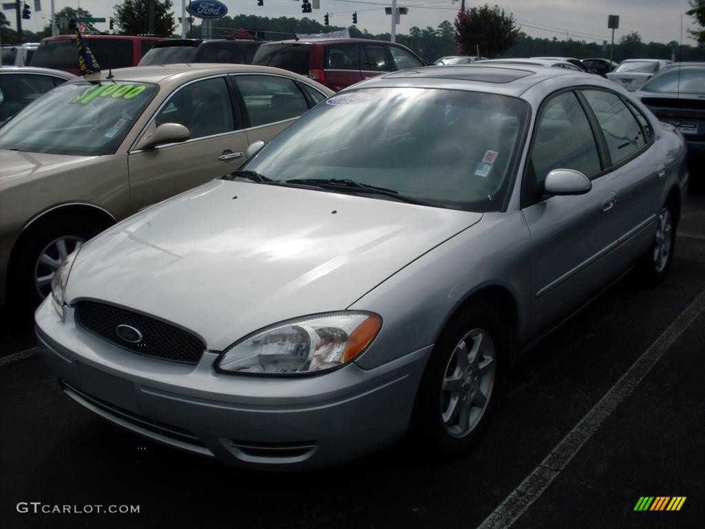 Silver Frost Metallic Ford Taurus