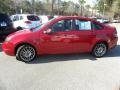 2010 Sangria Red Metallic Ford Focus SES Sedan  photo #2