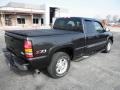 2004 Onyx Black GMC Sierra 1500 SLE Extended Cab 4x4  photo #24