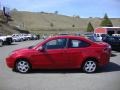 2010 Sangria Red Metallic Ford Focus SE Coupe  photo #4