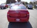 2010 Sangria Red Metallic Ford Focus SE Coupe  photo #6