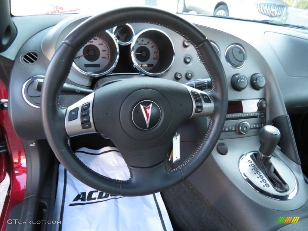 2009 Pontiac Solstice Roadster Ebony/Sand Steering Wheel Photo #79083700