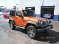 Mango Tango Pearl 2010 Jeep Wrangler Sport Mountain Edition 4x4