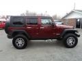 2009 Red Rock Crystal Pearl Jeep Wrangler Unlimited Rubicon 4x4  photo #23