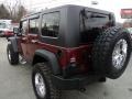 2009 Red Rock Crystal Pearl Jeep Wrangler Unlimited Rubicon 4x4  photo #27