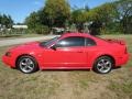 2004 Torch Red Ford Mustang GT Coupe  photo #24
