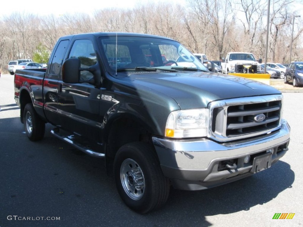 2004 F250 Super Duty XLT SuperCab 4x4 - Dark Green Satin Metallic / Medium Flint photo #1
