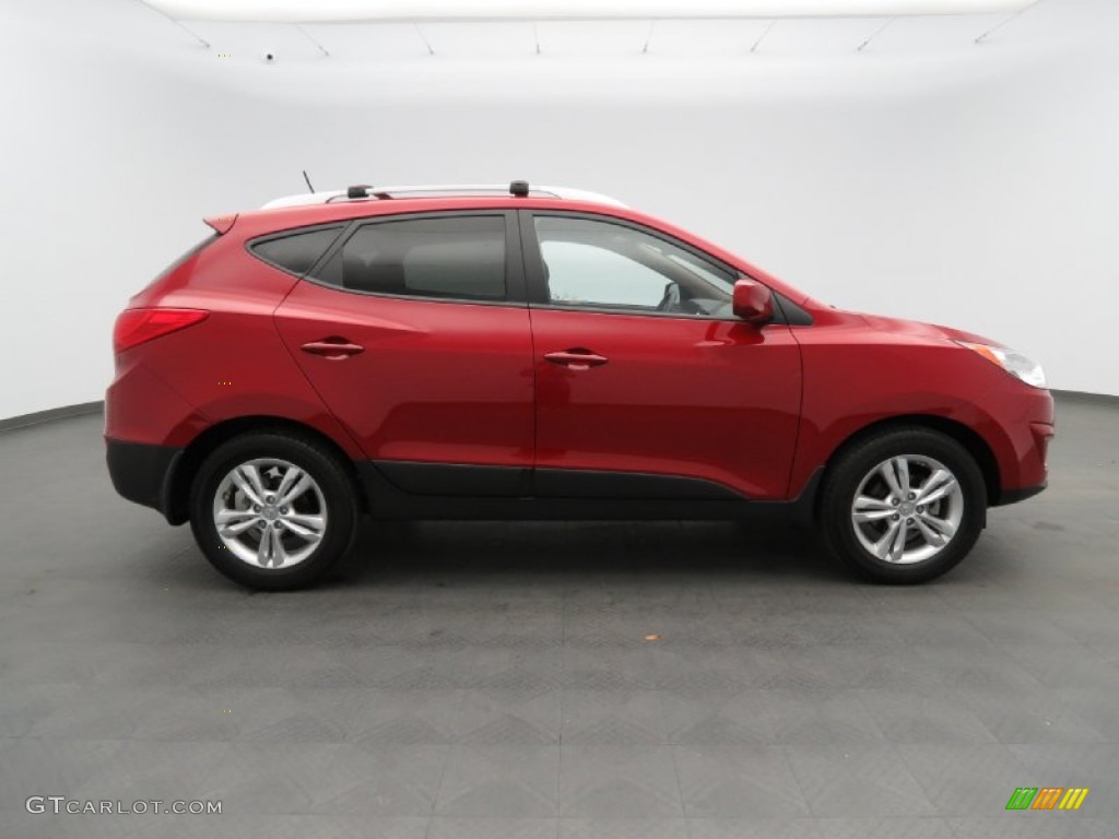 Garnet Red 2011 Hyundai Tucson GLS Exterior Photo #79163055