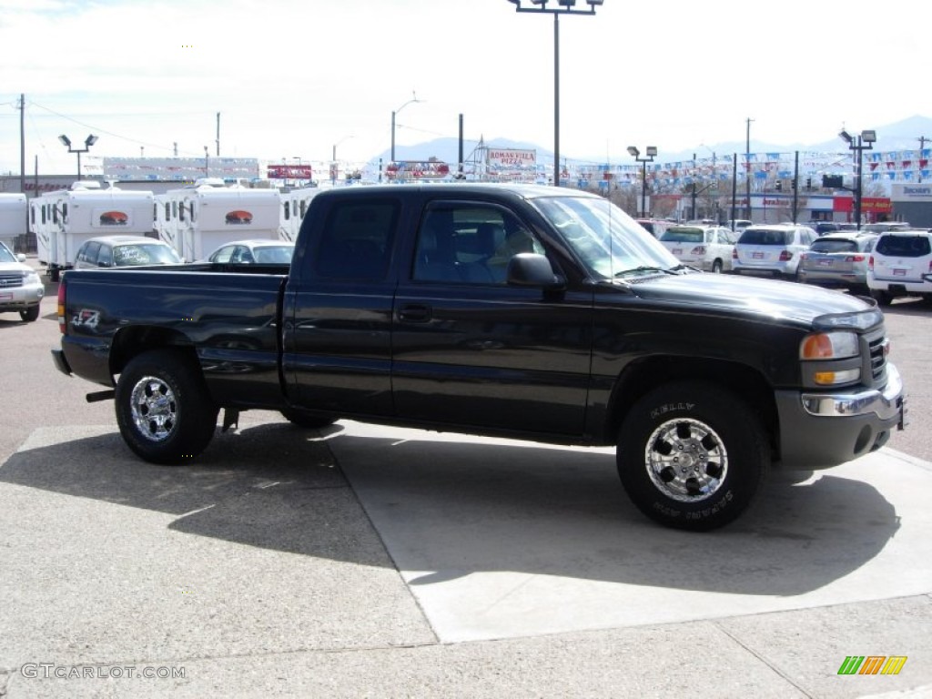 2004 Sierra 1500 SLE Extended Cab 4x4 - Carbon Metallic / Dark Pewter photo #13