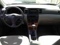 2006 Impulse Red Pearl Toyota Corolla LE  photo #11