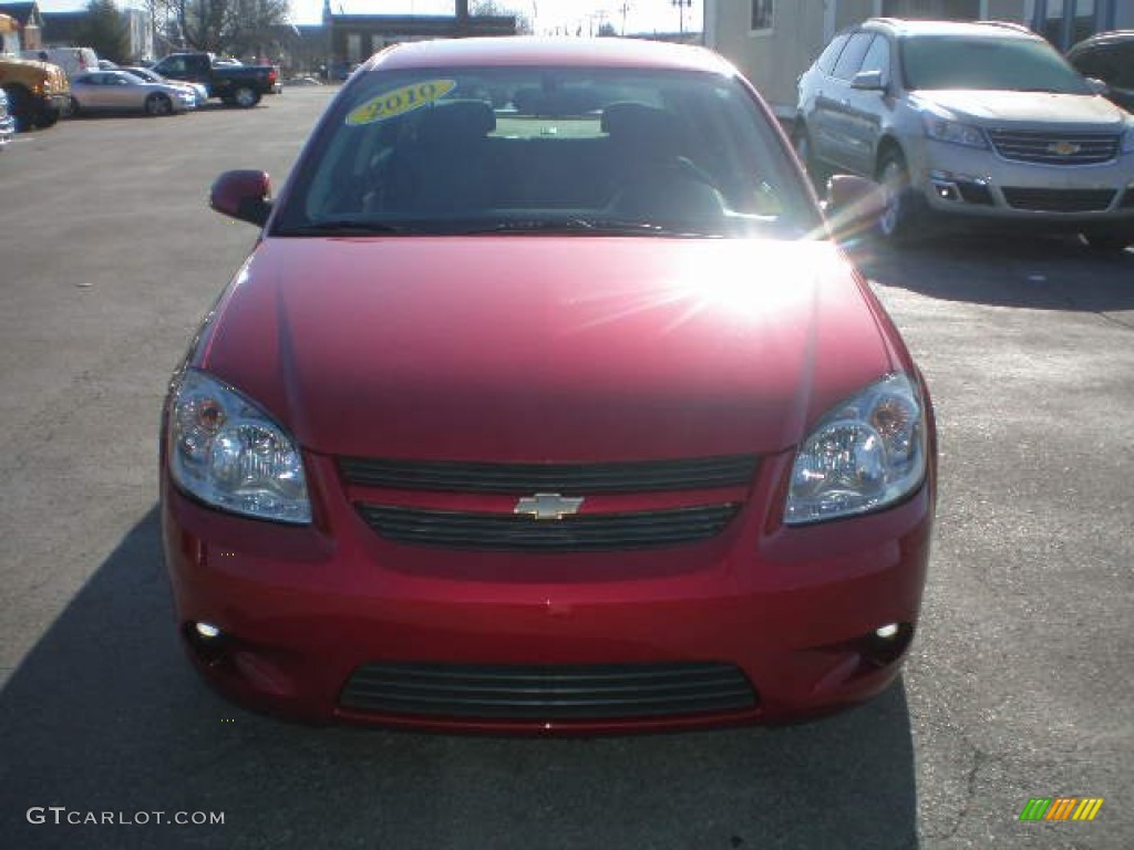 2010 Cobalt LT Sedan - Crystal Red Tintcoat Metallic / Ebony photo #7