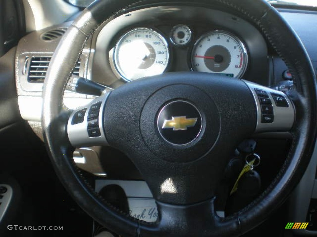2010 Cobalt LT Sedan - Crystal Red Tintcoat Metallic / Ebony photo #10