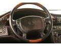 2004 Cadillac DeVille Black Interior Steering Wheel Photo