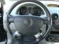2004 Chevrolet Aveo Gray Interior Steering Wheel Photo