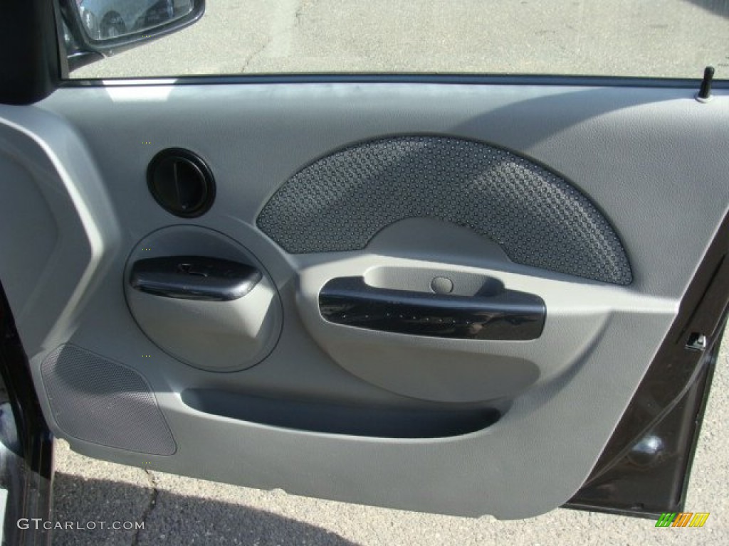 2004 Chevrolet Aveo LS Sedan Gray Door Panel Photo #79345305