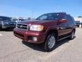 2001 Burnt Cherry Red Pearl Nissan Pathfinder LE 4x4  photo #1