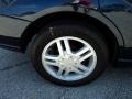 2003 Ford Focus SE Sedan Wheel and Tire Photo