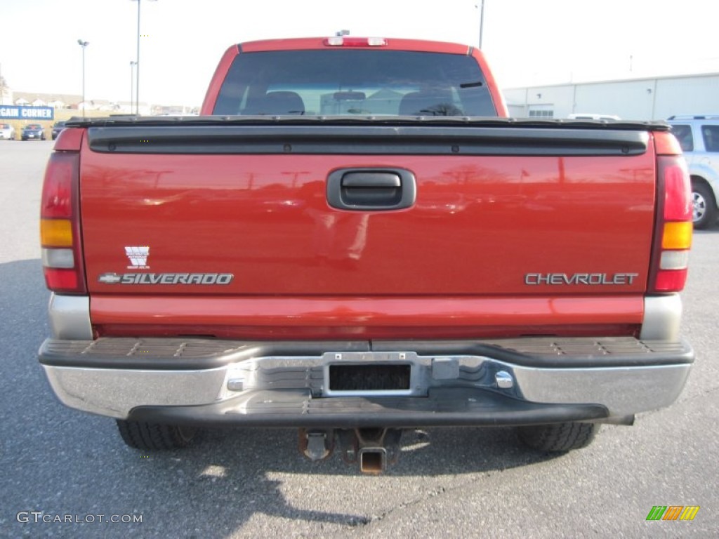 2001 Silverado 1500 LS Extended Cab 4x4 - Sunset Orange Metallic / Graphite photo #4