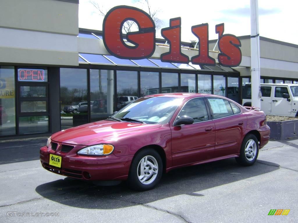 2004 Grand Am SE Sedan - Sport Red Metallic / Dark Taupe photo #1