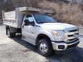 Front 3/4 View of 2011 F350 Super Duty XL Regular Cab 4x4 Chassis Dump Truck