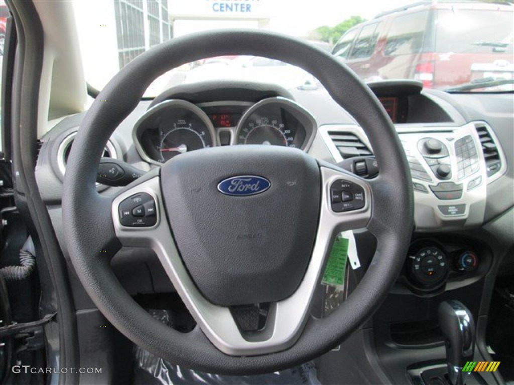 2011 Ford Fiesta SE Sedan Charcoal Black/Blue Cloth Steering Wheel Photo #79435927