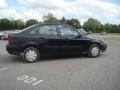 2003 Pitch Black Ford Focus LX Sedan  photo #4