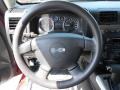 2010 Hummer H3 Ebony Interior Steering Wheel Photo