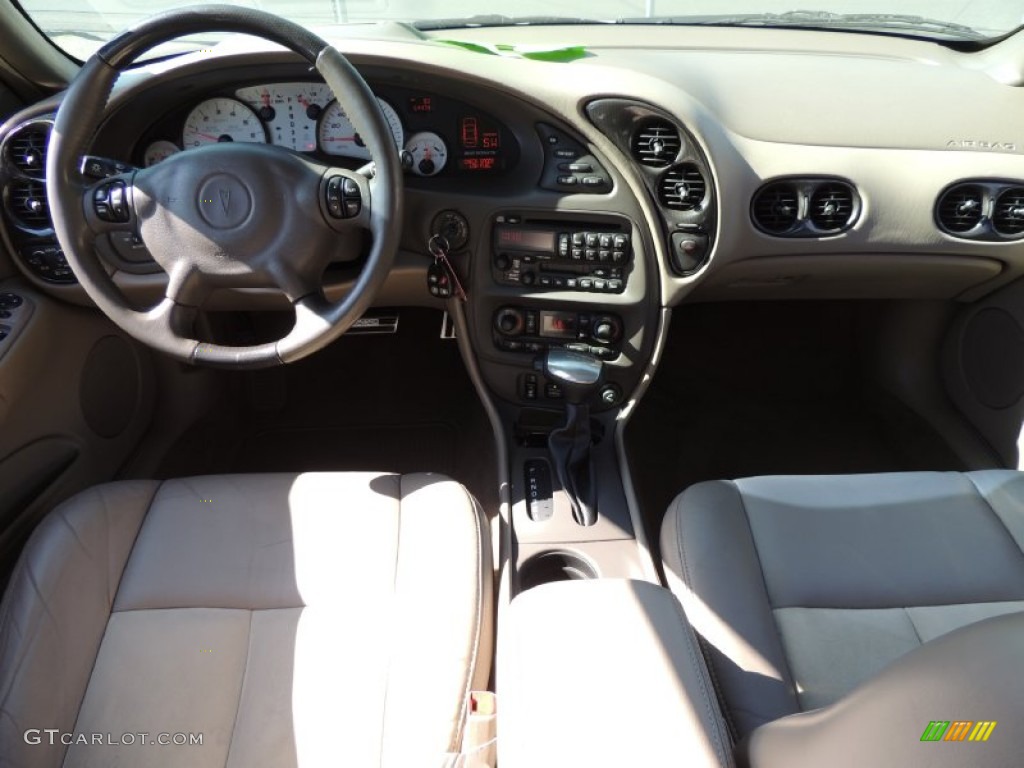 2004 Bonneville GXP - Ivory White / Taupe photo #17