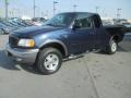 2002 True Blue Metallic Ford F150 XLT SuperCab 4x4  photo #3