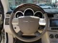 2010 Chrysler Sebring Medium Pebble Beige/Cream Interior Steering Wheel Photo