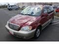 2003 Ruby Red Kia Sedona EX  photo #1