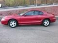 1994 Laser Red Tinted Metallic Ford Mustang GT Coupe  photo #2