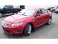 2010 Red Candy Metallic Ford Taurus SEL  photo #1