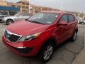 2013 Signal Red Kia Sportage LX AWD  photo #4