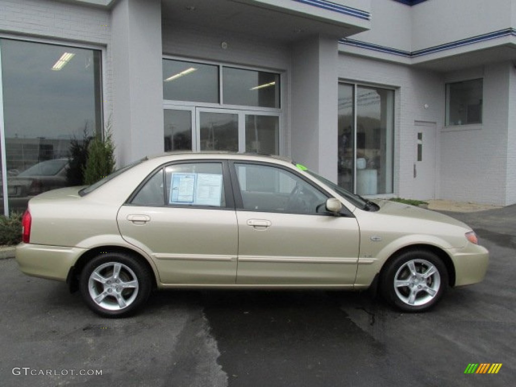 2003 Protege LX - Light Sandalwood Metallic / Beige photo #2