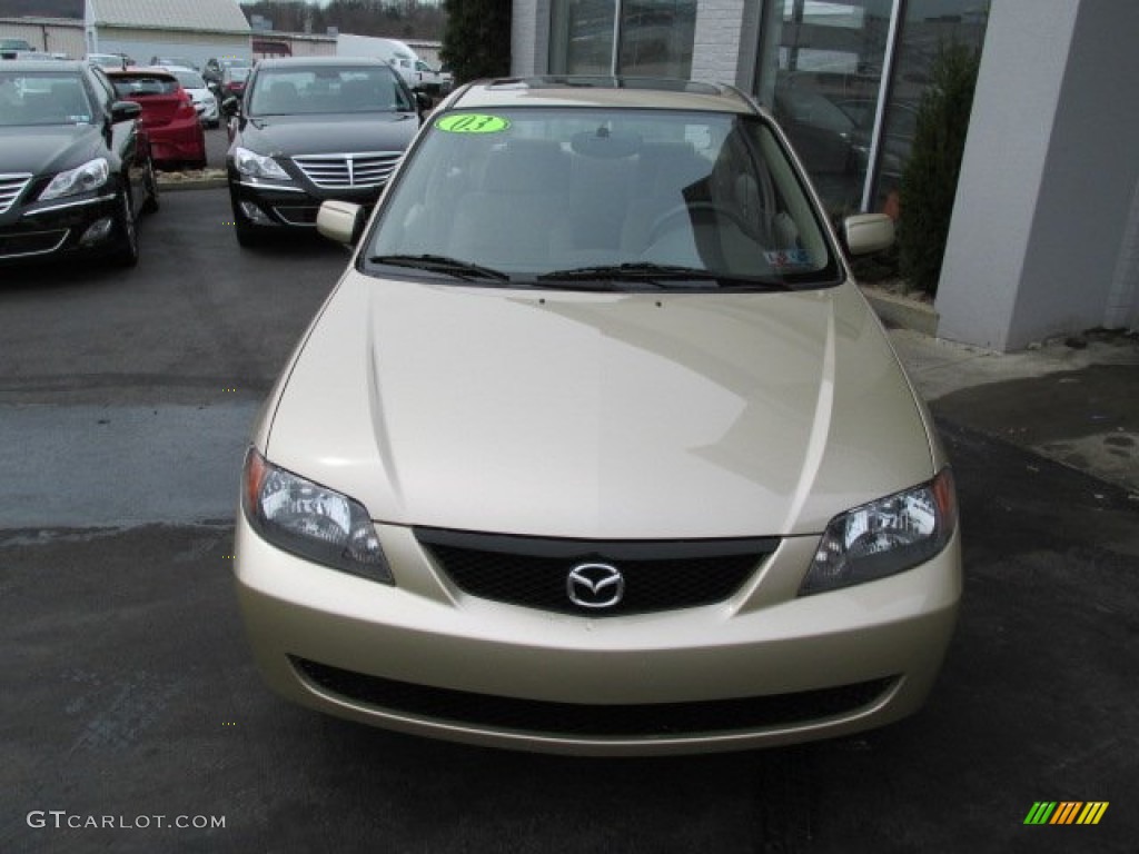 2003 Protege LX - Light Sandalwood Metallic / Beige photo #5