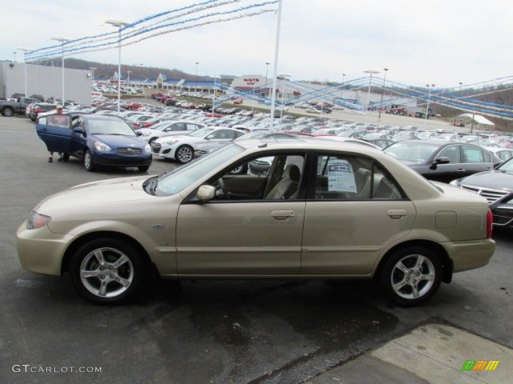 2003 Protege LX - Light Sandalwood Metallic / Beige photo #7
