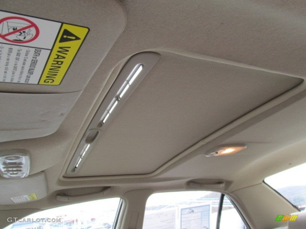 2003 Protege LX - Light Sandalwood Metallic / Beige photo #12