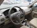 Beige 2003 Mazda Protege LX Dashboard