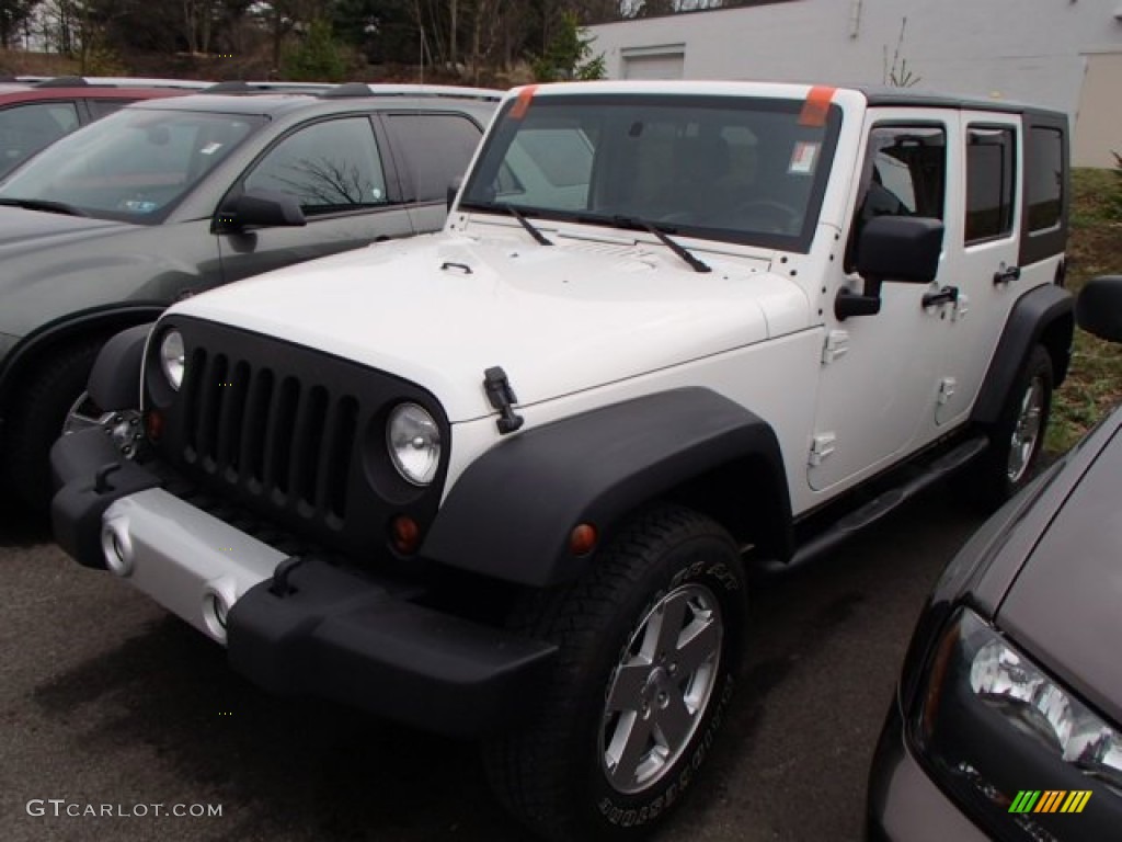 Stone White 2009 Jeep Wrangler Unlimited X 4x4 Exterior Photo #79648601