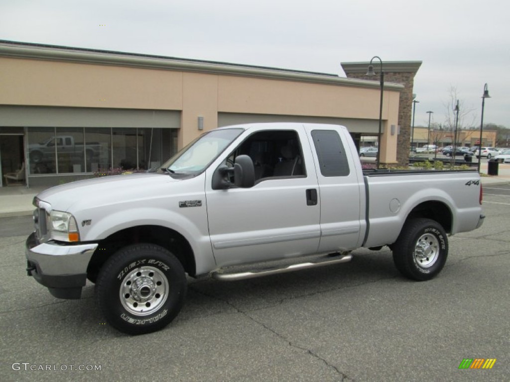 Silver Metallic 2002 Ford F250 Super Duty XLT SuperCab 4x4 Exterior Photo #79654086