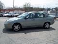 2004 Light Tundra Metallic Ford Focus ZTS Sedan  photo #1