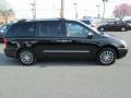 2011 Midnight Black Kia Sedona EX  photo #5