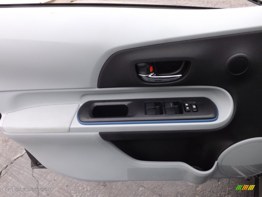 2013 Toyota Prius c Hybrid Three Light Blue Gray/Black Door Panel Photo #79682961