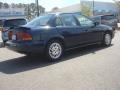 1999 Dark Blue Saturn S Series SL2 Sedan  photo #4