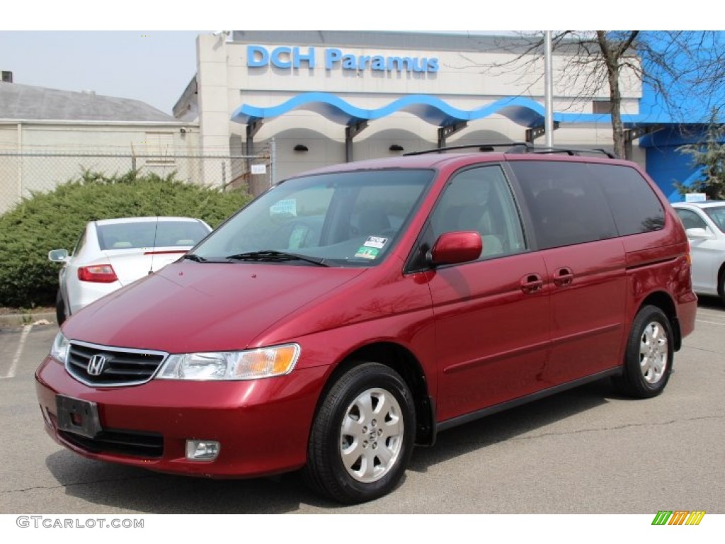 Red Rock Pearl Honda Odyssey