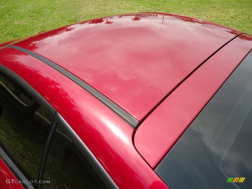 2006 Tiburon Tuscani - Electric Red / Black photo #21